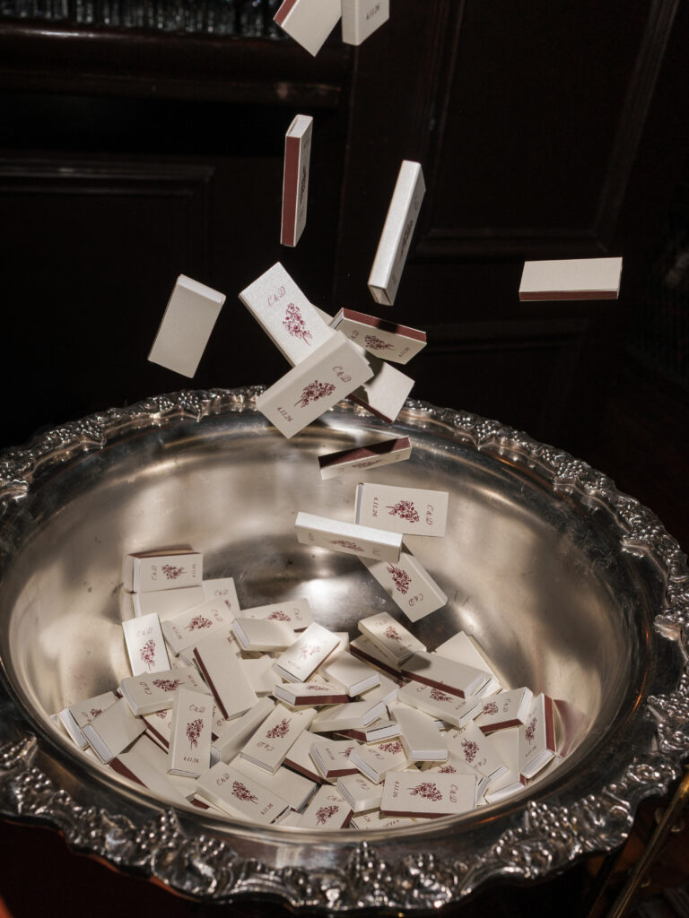 Custom ivory and burgundy wedding matchbooks with a vintage-inspired monogram