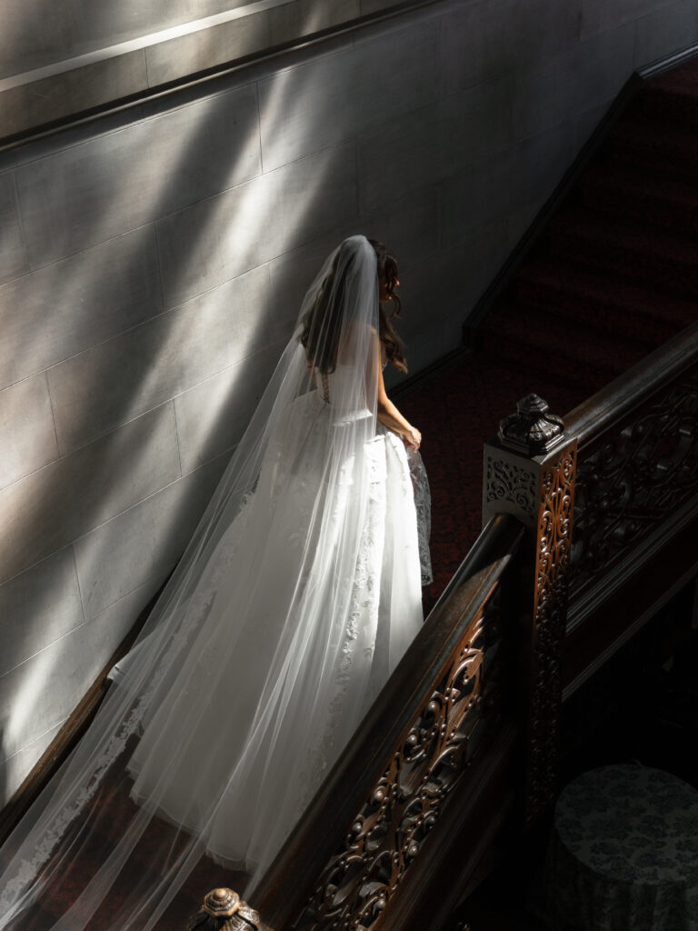 Bride wearing an embroidered Kim Kassas Couture gown at Hempstead House